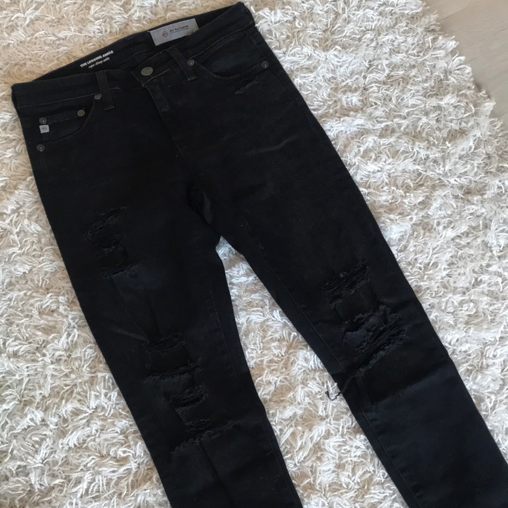 Black ripped AG skinny jeans